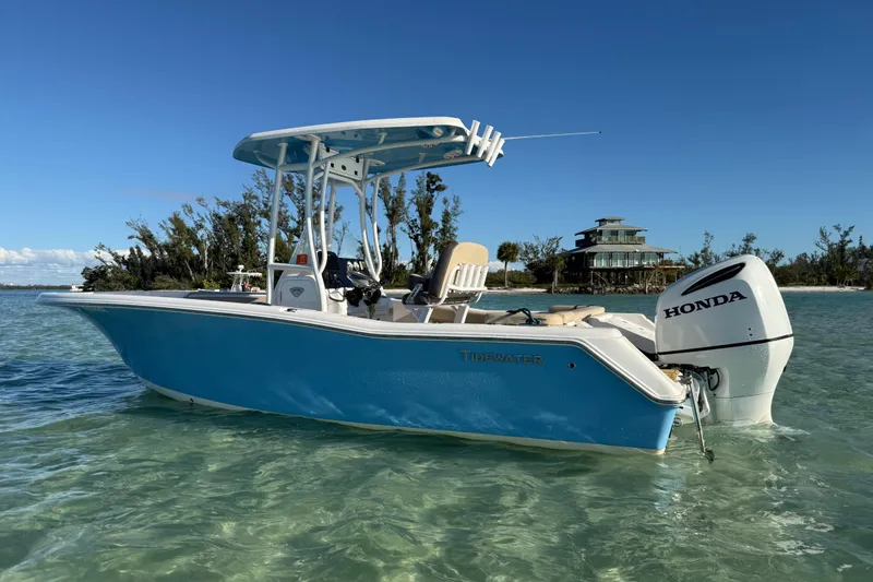 Slide: The Image of 2019 Tidewater 220 LXF boat with Honda engine in clear water, sunny day. - 15