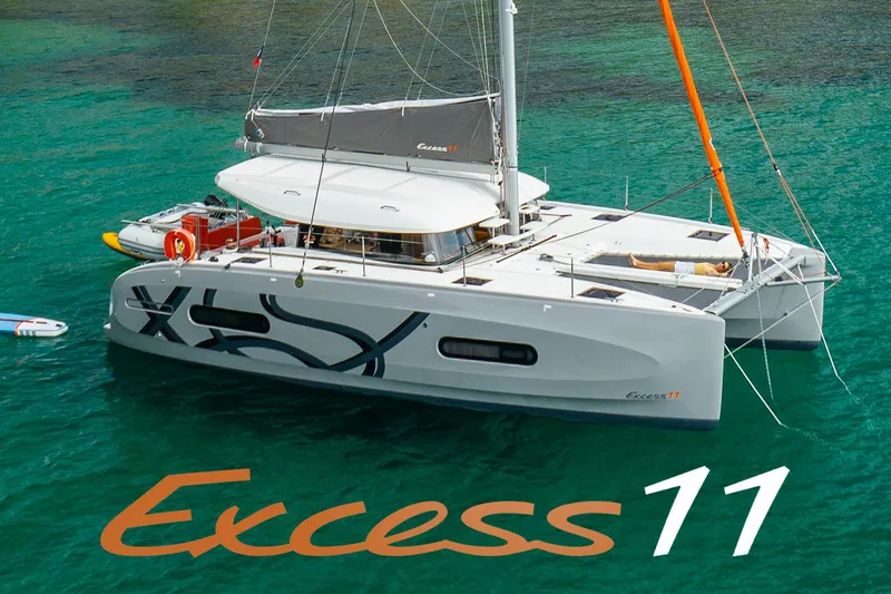 The Image of 2026 Excess 11 catamaran sailing in clear turquoise waters. - 0