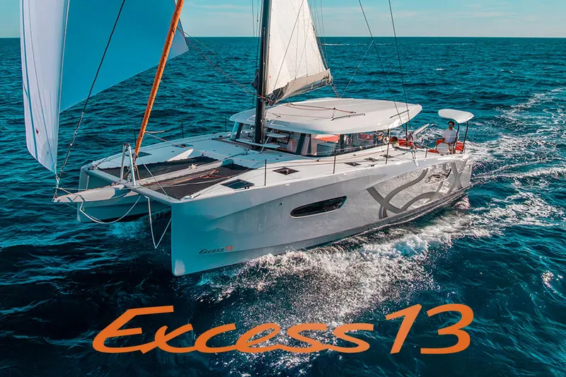 The Image of Sailing catamaran Excess 13, 2026 model, cruising on open ocean waters. - 0