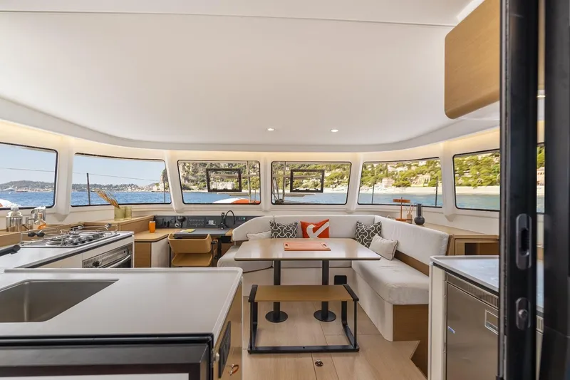 Slide: The Image of Manufacturer Provided Image: Luxurious interior of 2026 Excess 13 yacht with panoramic windows and modern furnishings. - 10