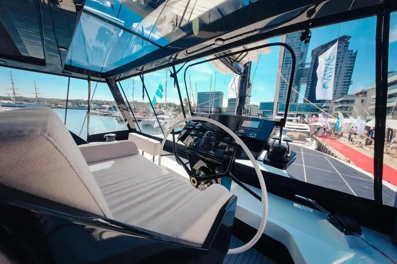 Slide: The Image of Sailing on a 2024 Wave Wave60 yacht under clear blue skies. - 10