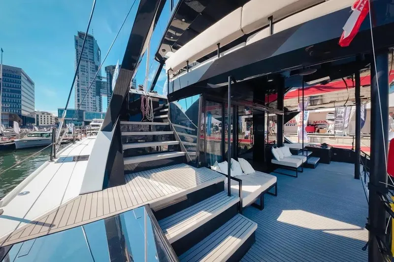 Slide: The Image of Modern 2024 Wave60 yacht cockpit with panoramic marina view. - 12