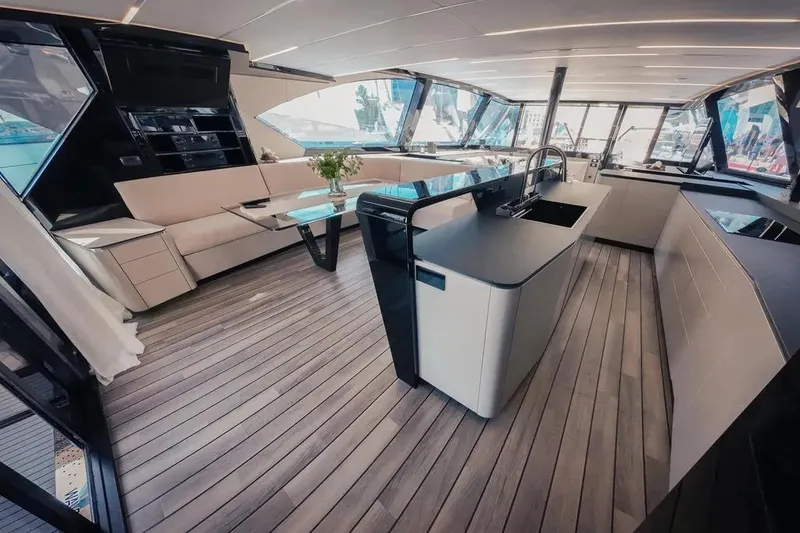 Slide: The Image of Luxurious interior of 2024 Wave Wave60 yacht with modern furnishings and large windows. - 18