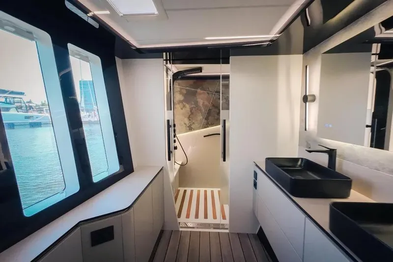 Slide: The Image of Modern interior of 2024 Wave Wave60 yacht with sleek design and wooden flooring. - 23