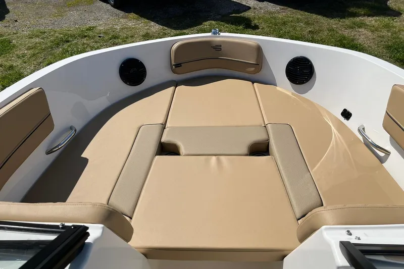 Slide: The Image of 2026 Bayliner VR6 Bowrider OB with beige seating and sleek design. - 19