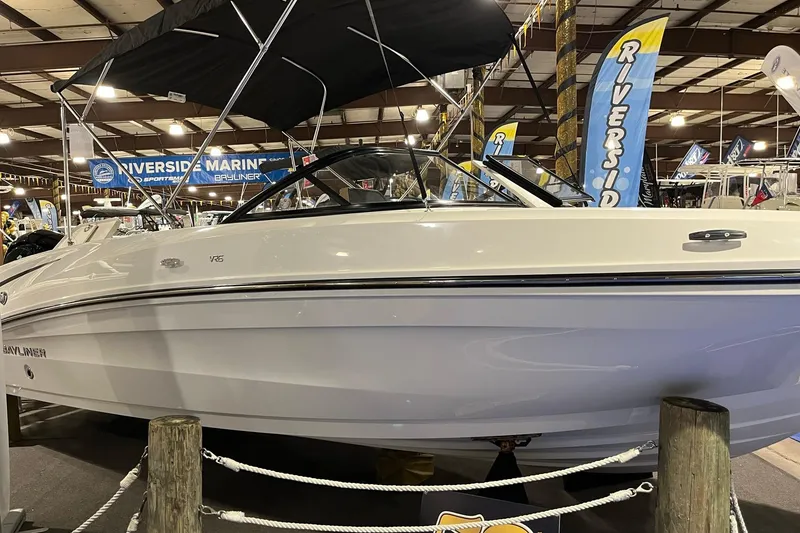 Slide: The Image of 2026 Bayliner VR6 Bowrider OB displayed at Riverside Marine showroom. - 3