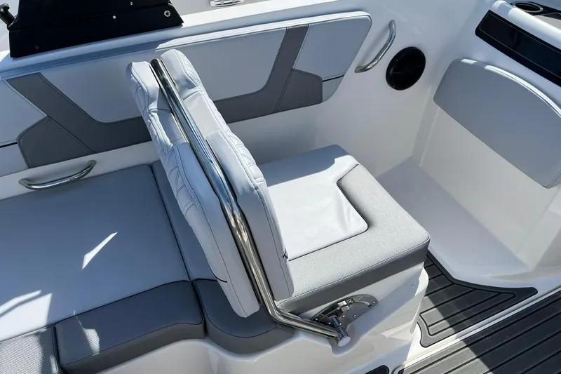 Slide: The Image of 2026 Bayliner VR6 Bowrider OB interior seating with sleek design and modern upholstery. - 10
