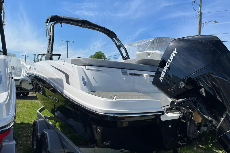 Slide: The Image of 2026 Bayliner VR6 Bowrider OB with Mercury outboard engine on display. - 4