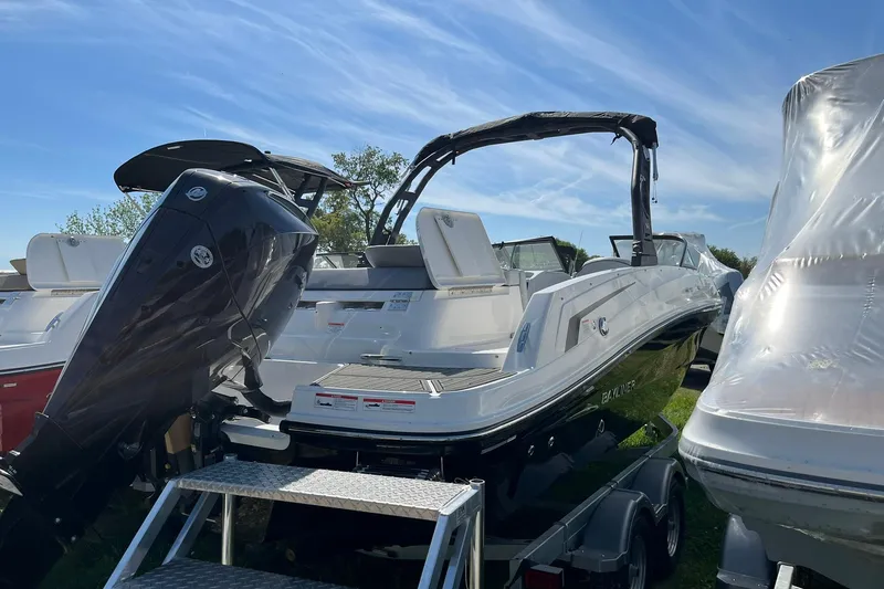 Slide: The Image of 2026 Bayliner VR6 Bowrider OB on trailer, featuring sleek design and powerful outboard motor. - 5