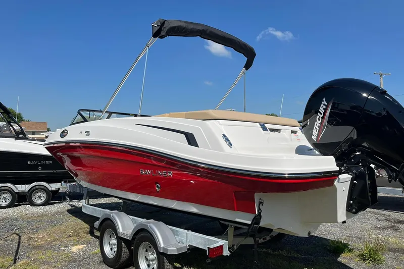 Slide: The Image of 2026 Bayliner VR6 Bowrider OB with Mercury outboard engine on trailer. - 6