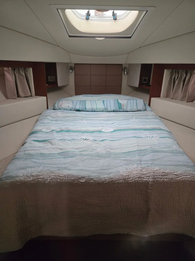 Slide: The Image of Interior of 2007 Sea Ray 36 Sedan Bridge with cozy bed. - 18