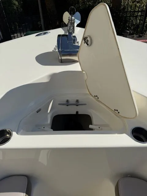 Slide: The Image of Open storage compartment on Key West 244 Center Console boat, 2020 model. - 11