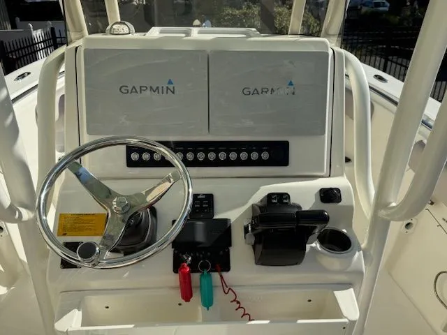 Slide: The Image of Helm of a 2020 Key West 244 Center Console boat. - 15