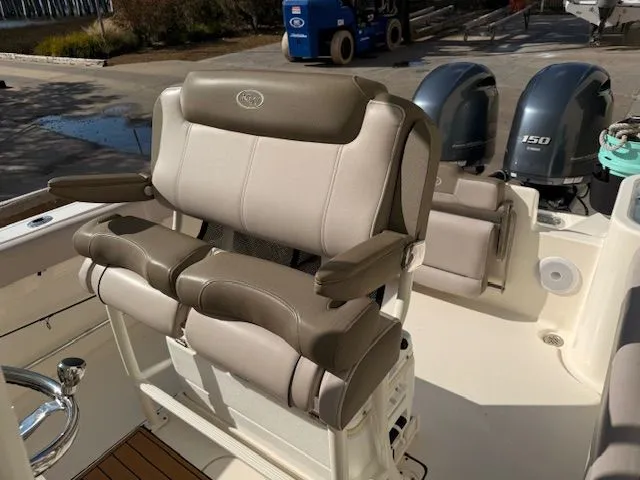 Slide: The Image of Key West 244 Center Console 2020 with dual seats and engines. - 16