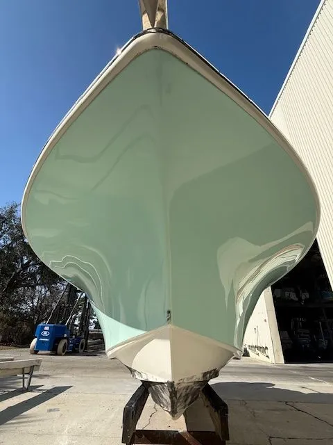 Slide: The Image of Key West 244 Center Console boat, front view, 2020 model. - 2