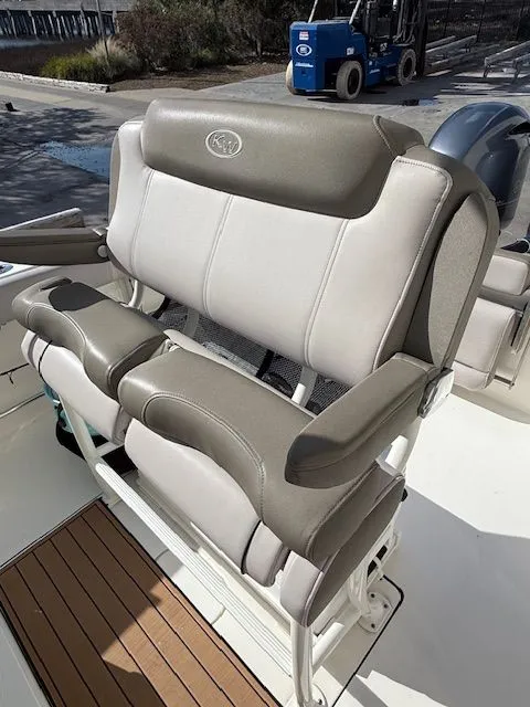 Slide: The Image of Cushioned bench on Key West 244 Center Console boat, year 2020. - 23