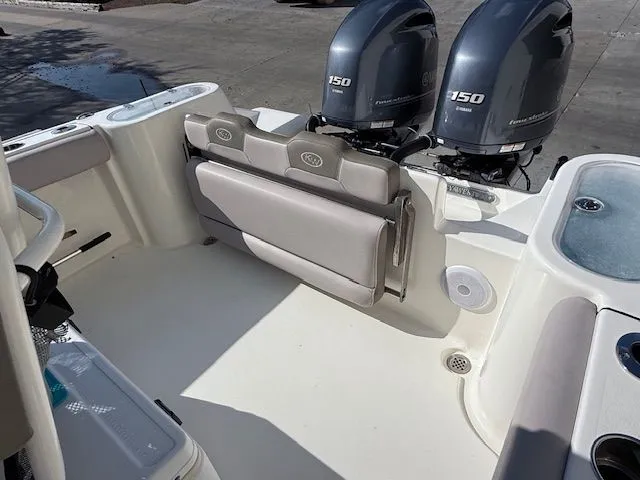 Slide: The Image of Interior of a 2020 Key West 244 Center Console boat with dual engines. - 25