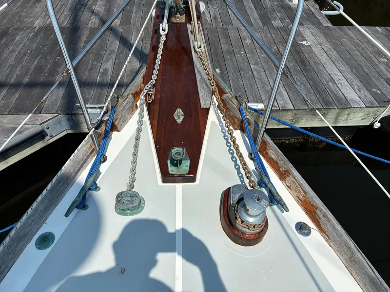 Slide: The Image of Bow of a 2001 Cape Dory Robinhood 36 with windlass and wooden details. - 20