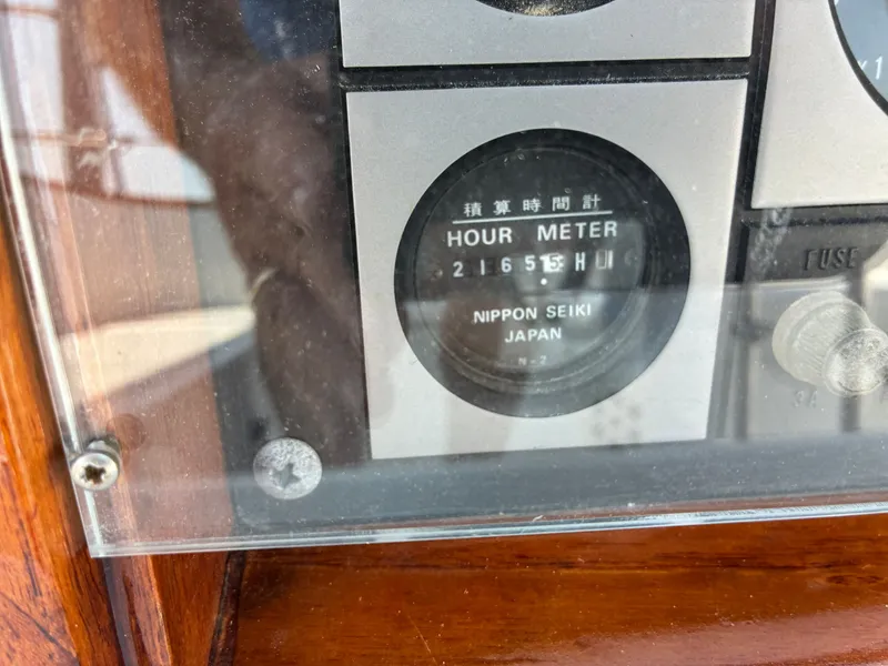 Slide: The Image of Close-up of an hour meter showing 2165.5 hours on a 2001 Cape Dory Robinhood 36. - 29