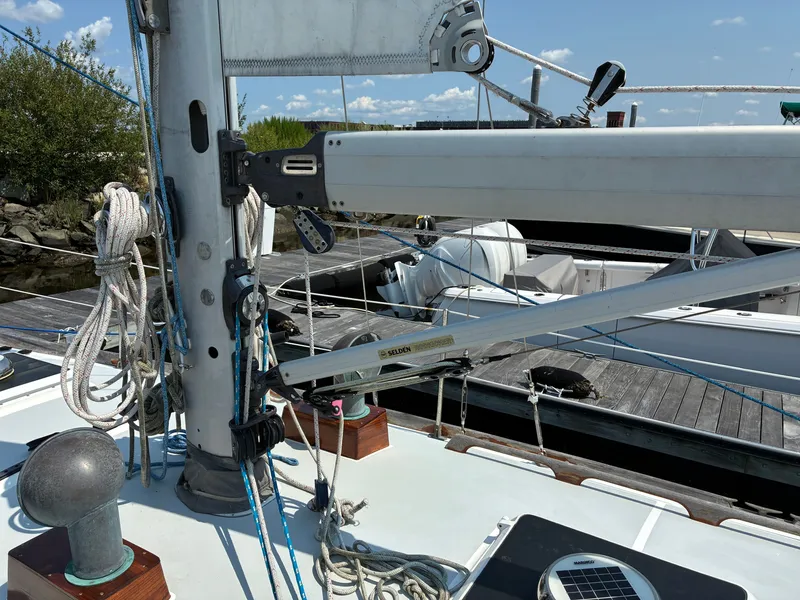 Slide: The Image of The image shows the deck of a 2001 Cape Dory Robinhood 36 with sailing equipment. - 9