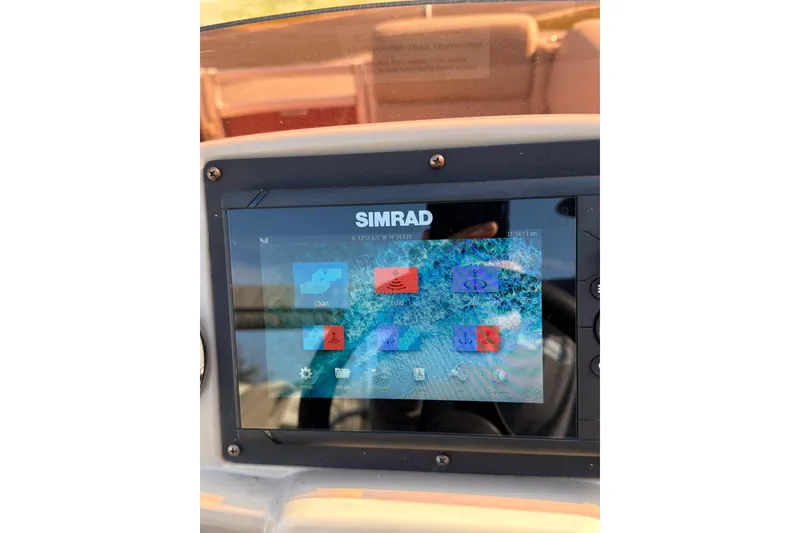Slide: The Image of Simrad navigation display on 2021 Avalon VENTURE 1875 boat dashboard. - 10
