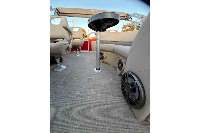 Slide: The Image of Interior of 2021 Avalon VENTURE 1875 boat with seating and speakers. - 15