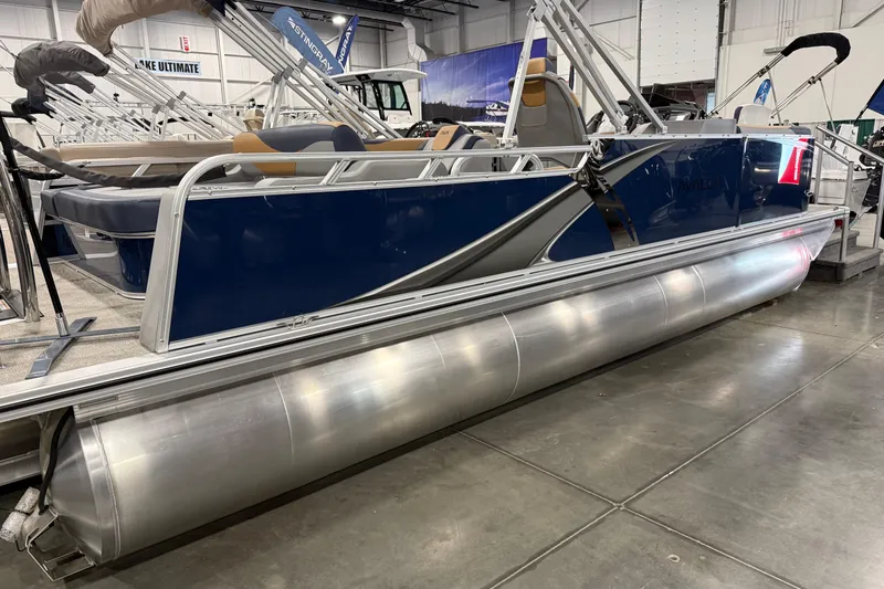 Slide: The Image of 2026 Avalon 2385 LSZ VRB pontoon boat displayed indoors. - 2
