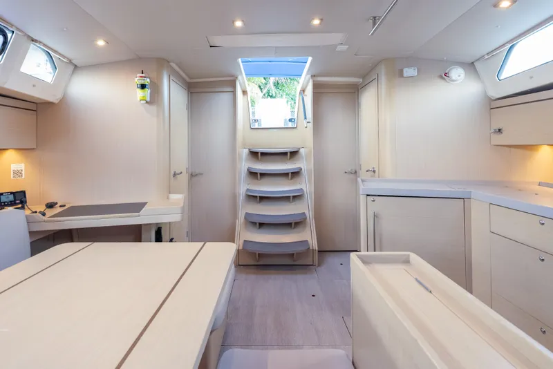 Slide: The Image of Interior of 2020 Beneteau Oceanis 46.1 yacht, featuring modern design and light wood finishes. - 26