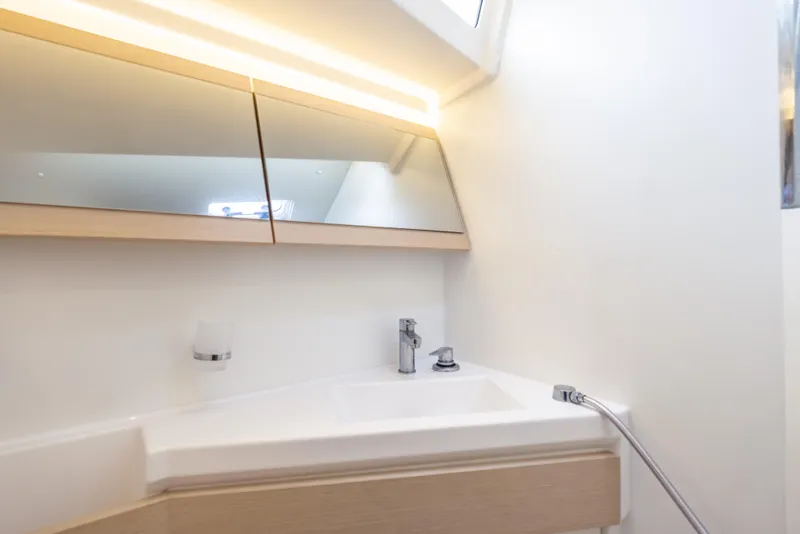 Slide: The Image of Modern bathroom interior of 2020 Beneteau Oceanis 46.1 yacht with sleek fixtures. - 28