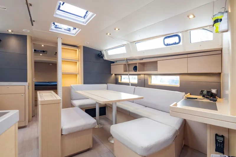Slide: The Image of Luxurious interior of 2020 Beneteau Oceanis 46.1 yacht with modern seating and ample natural light. - 31