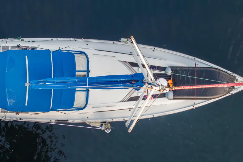 Slide: The Image of Overhead view of 2020 Beneteau Oceanis 46.1 sailboat with blue covers. - 6