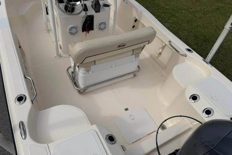 Slide: The Image of 2007 Key West 176 Sportsman CC boat interior with seating and steering console. - 10