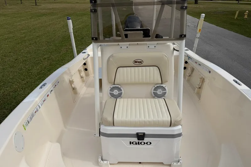 Slide: The Image of 2007 Key West 176 Sportsman CC boat interior with Igloo cooler and seating. - 15