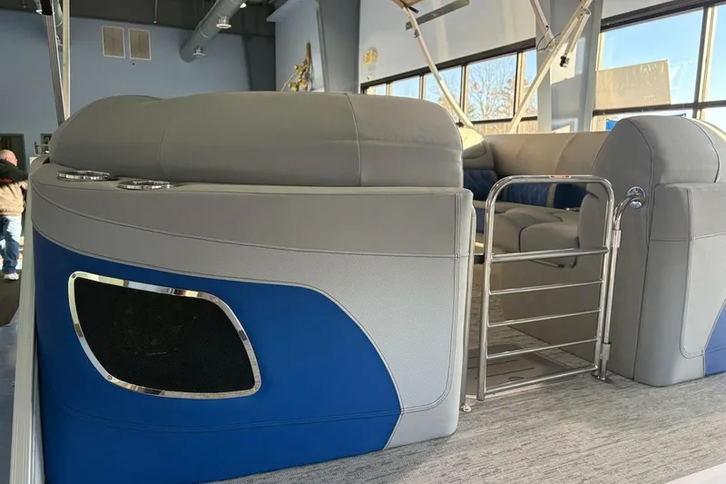 Slide: The Image of 2026 Bennington 23LXSFB pontoon boat interior with gray and blue seating. - 3