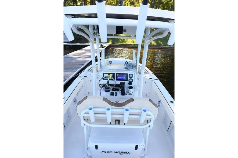 Slide: The Image of Manufacturer Provided Image: 2025 Stingray 236 CC boat interior with modern dashboard and seating. - 18