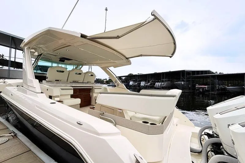 Slide: The Image of 2025 Tiara Yachts 38 LS luxury boat with spacious seating and modern design. - 15