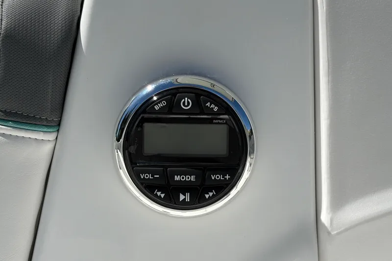 Slide: The Image of Control panel on 2026 Tahoe T16 boat with volume and mode buttons. - 30