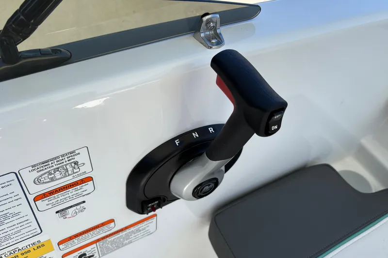 Slide: The Image of Throttle control lever on 2026 Tahoe T16 boat, featuring forward, neutral, and reverse settings. - 24