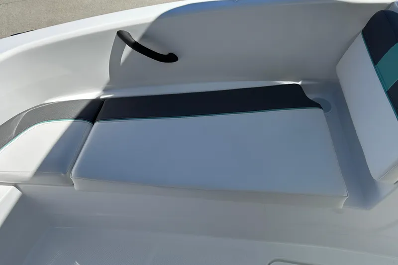 Slide: The Image of 2026 Tahoe T16 boat interior with sleek white and black seating design. - 36