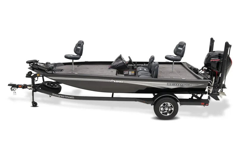 The Image of 2026 Ranger RT188P fishing boat on trailer outside a marine store. - 1