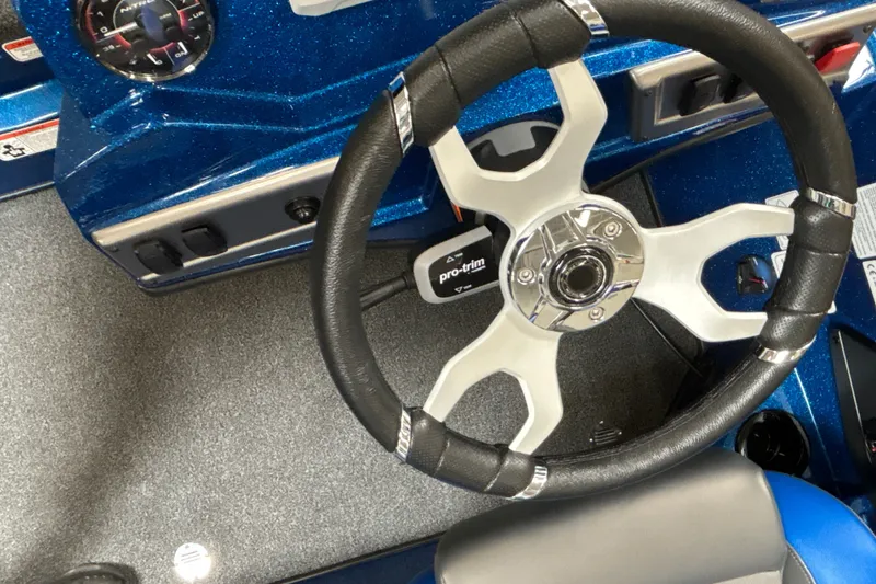 Slide: The Image of Steering wheel and dashboard of 2026 Nitro Z19 XL Pro boat. - 16