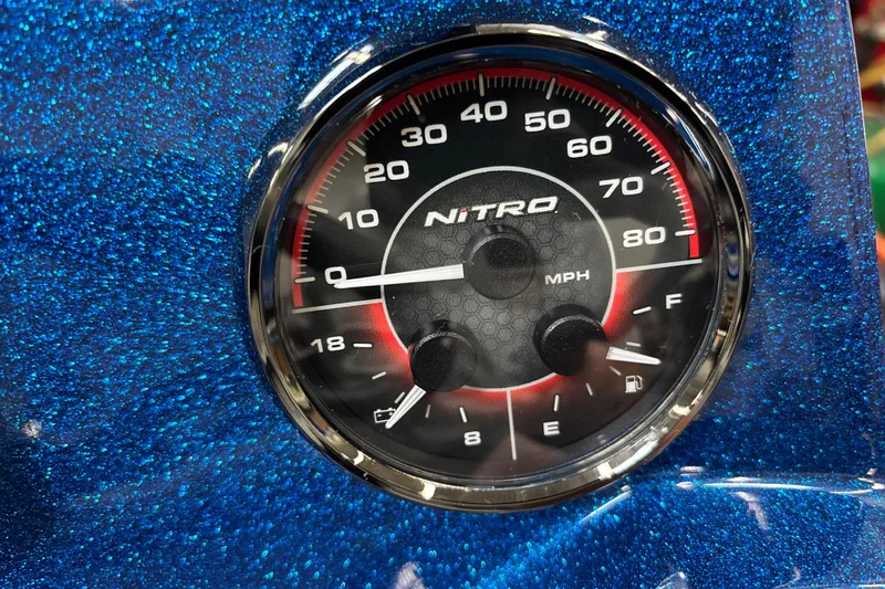 Slide: The Image of Speedometer of 2026 Nitro Z19 XL Pro on glittery blue dashboard. - 19