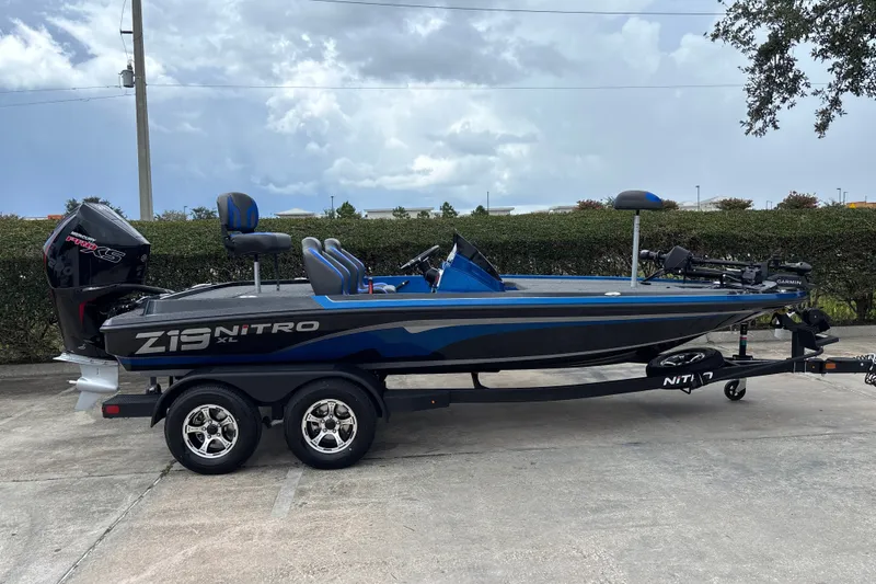 Slide: The Image of The image shows a 2026 Nitro Z19 XL Pro boat on a trailer, ready for the water. - 3
