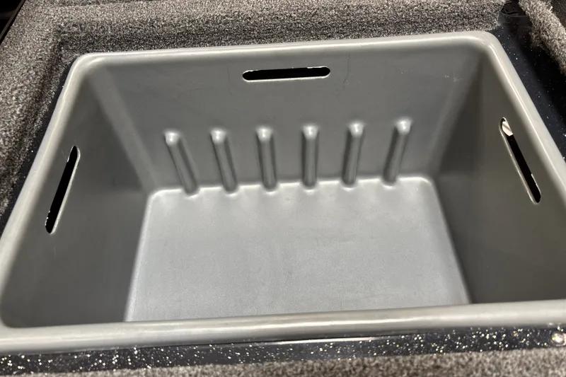 Slide: The Image of Empty storage compartment in 2026 Nitro Z19 XL Pro boat. - 25