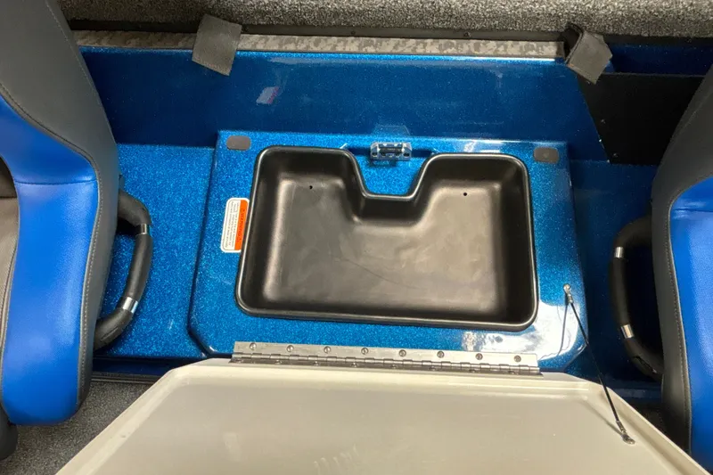 Slide: The Image of Interior of 2026 Nitro Z19 XL Pro boat with blue seating and storage compartment. - 31