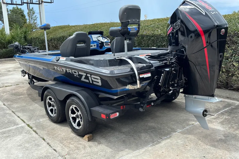 Slide: The Image of 2026 Nitro Z19 XL Pro boat with powerful outboard motor on a trailer. - 5