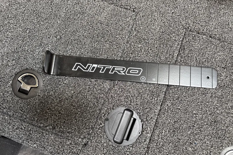 Slide: The Image of 2026 Nitro Z19 XL Pro boat deck with branded measuring tool. - 35