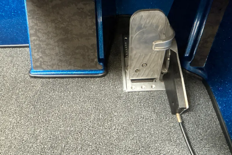 Slide: The Image of Foot pedal assembly in a 2026 Nitro Z19 XL Pro boat, featuring textured flooring. - 22