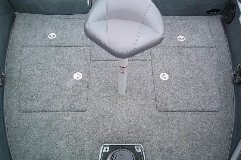 Slide: The Image of Interior of Nitro ZV19 Sport 2026 with gray carpet flooring. - 13