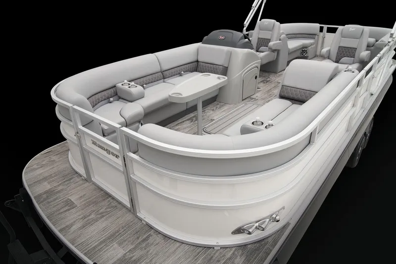 Slide: The Image of 2025 Ranger Reata 243C boat seating with integrated storage compartment, beige upholstery. - 29